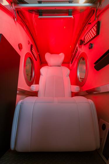 The chamber seat framed by its two portholes