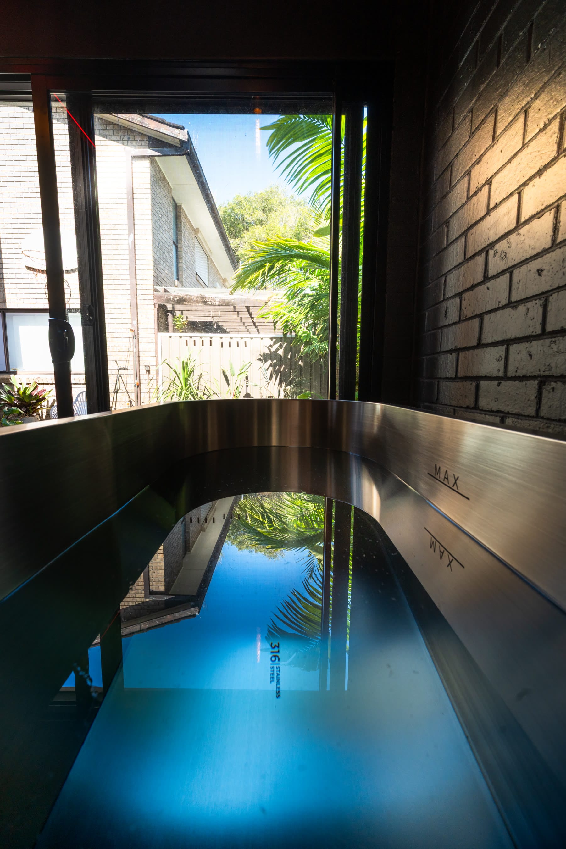 The still surface of the cold plunge